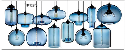 A collection of modern pendant lights with translucent light blue glass and black metal fixtures for bedroom and dining room
