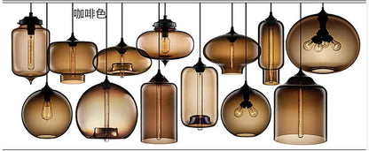 A collection of modern pendant lights with coffee-colored glass and exposed filament bulbs for bedroom and loft decor