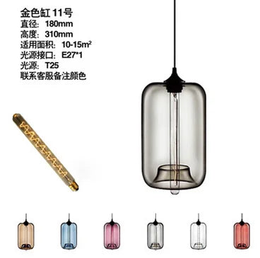 Modern pendant light with a dark tinted cylindrical glass shade and black metal top for bedroom dining room decor