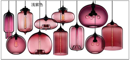 A collection of modern pendant lights with soft purple glass shades and black metal fixtures for bedroom and dining room