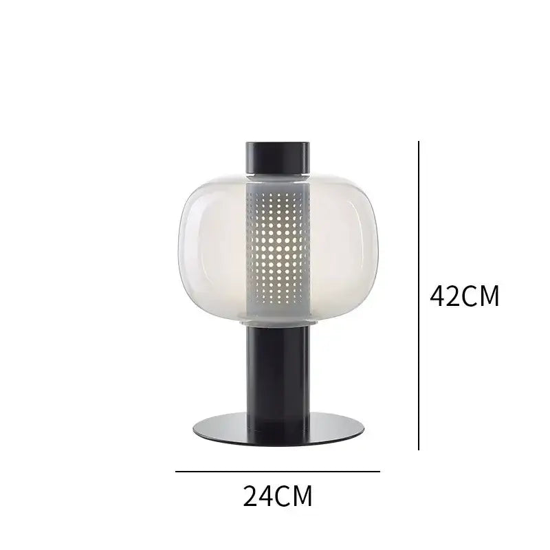 Modern perforated glass table lamp with frosted globe and black base ideal for bedroom and living room decorbites glass table lamp