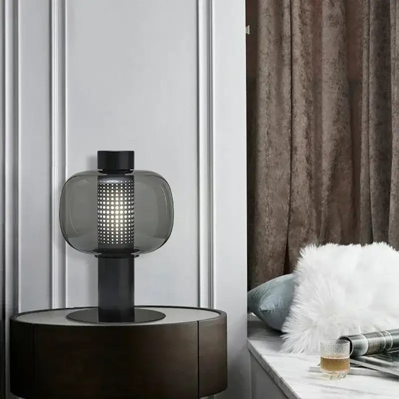 Modern black and gray perforated glass table lamp with sleek cylindrical base for bedroom and living room decorbites glass table lamp