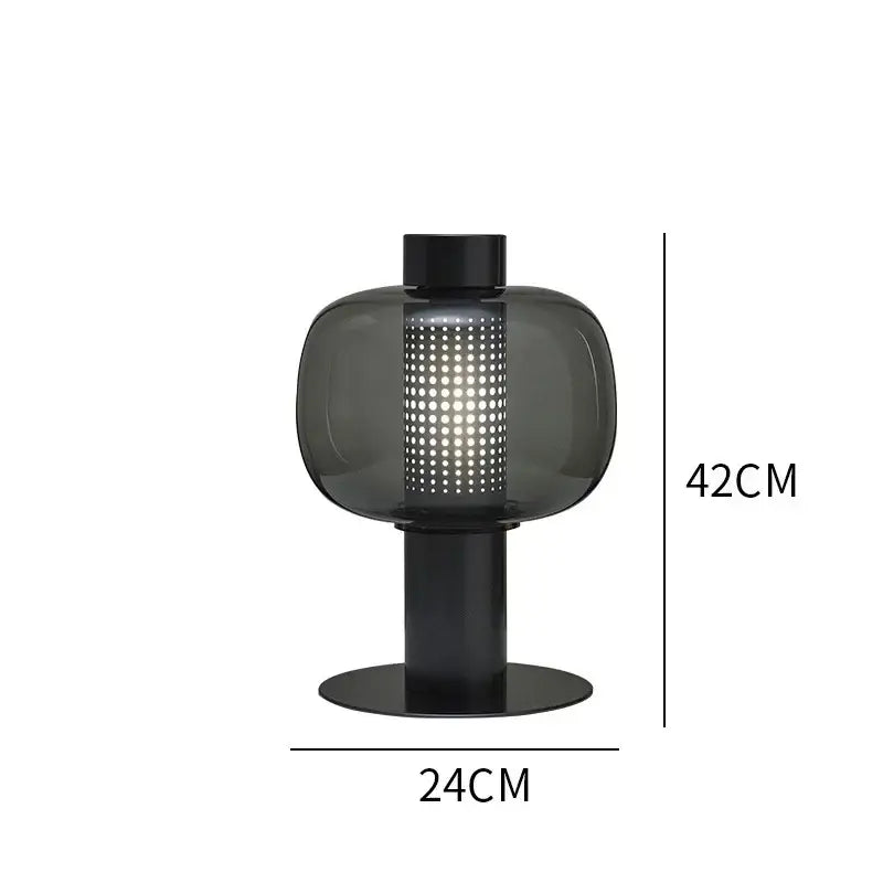 Modern perforated glass table lamp with dark gray translucent body and black metal base for bedroom and living room decorbites glass table