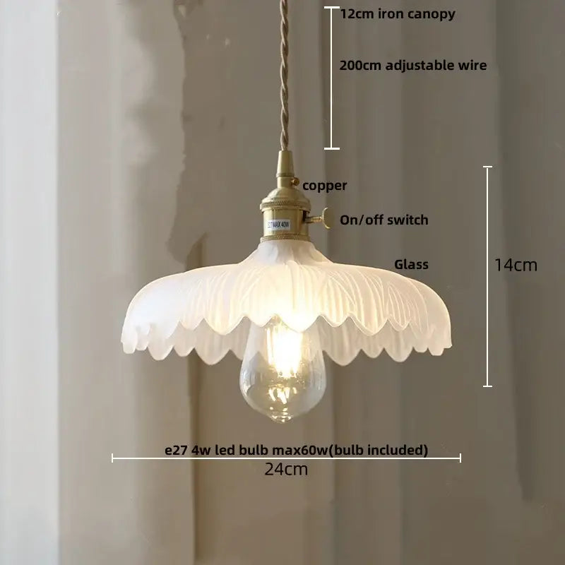 A delicate off-white glass led pendant lamp with scalloped petal shade and brass copper hardware for dining room