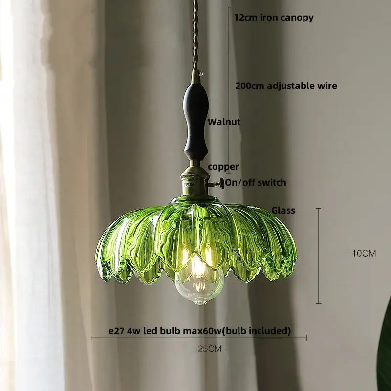 Green glass led pendant lamp with walnut-finished iron canopy and copper switch for modern dining room use
