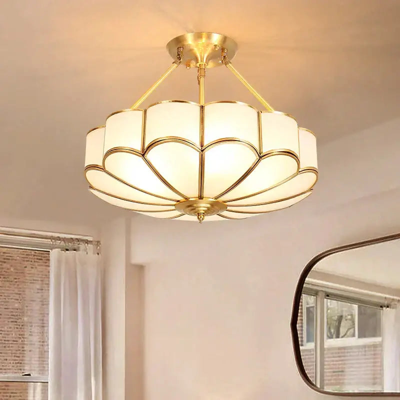 Modern petal brass ceiling lamp with gold-toned brass and frosted glass panels for bedroom decorbites brass ceiling lighting