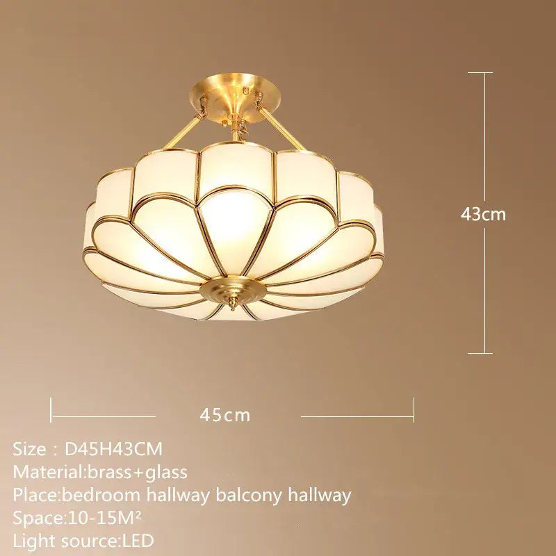 Modern petal brass ceiling lamp with gold-toned brass and frosted glass featuring a petal-like design decorbites brass ceiling