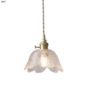 Modern petal clear glass led pendant lamp with textured petals and brass hardware for dining room decorbites clear glass