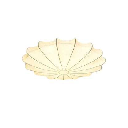 Cream-colored shell-shaped ceiling lamp with translucent material and subtle radial lines from decorbites cream silk led collection