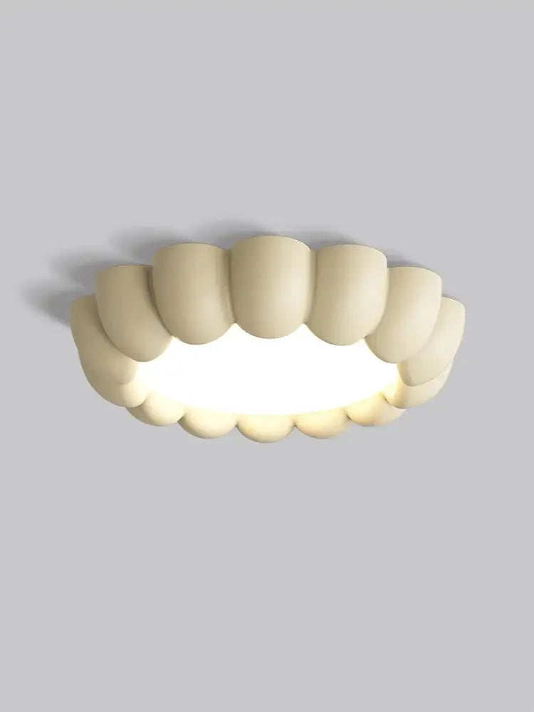 Modern petal cream wind ceiling lights feature a cream-colored tooth-shaped fixture with a smooth matte finish for bedroom decorbites cream wind