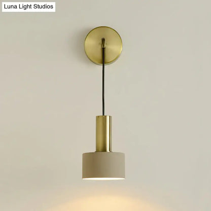 Modern pink and brass bedside reading light with a brass-finished minimalist pendant and warm ambient glow e14 e26 e27