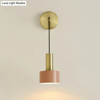 Modern pink and brass bedside reading pendant light with brushed brass mount black cord and pink matte shade e14 e26 e27