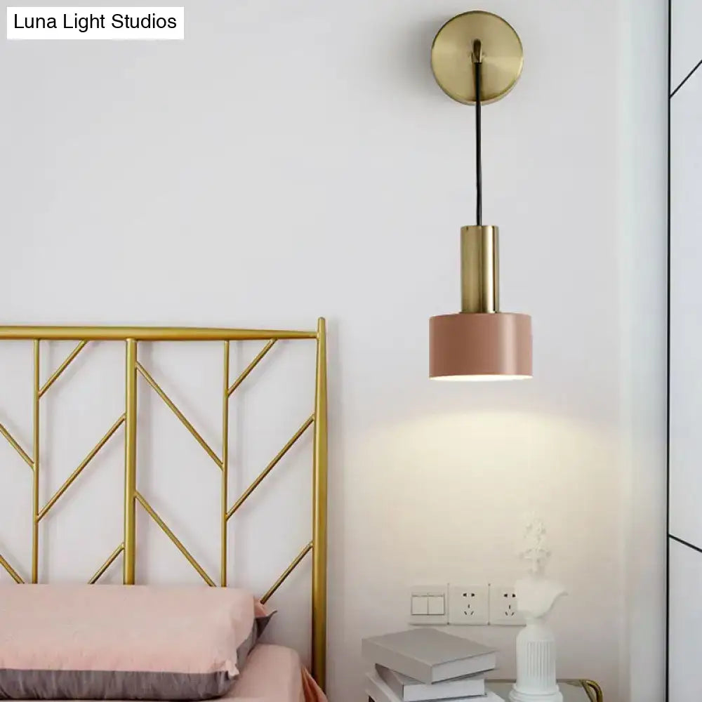A modern pendant bedside reading light with gold-finished metal and a cylindrical pink shade compatible with e14 e26 e27 bulbs