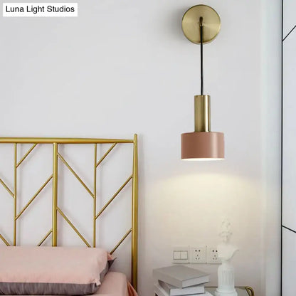 A modern pendant bedside reading light with gold-finished metal and a cylindrical pink shade compatible with e14 e26 e27 bulbs