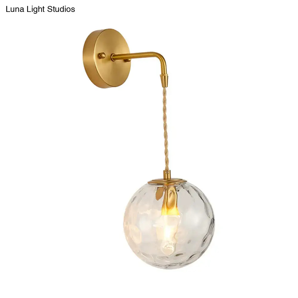 Gold-finished modern pink and brass bedside reading wall sconce with textured clear glass globe and twisted cord for e14 e26 e27 bulbs