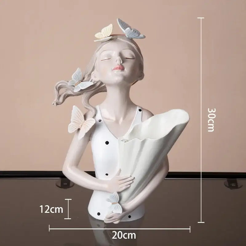Delicate white ceramic butterfly girl sculpture with light butterflies suitable for modern living room decorbites decor