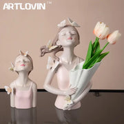 Modern pink butterfly girl sculpture resin figurine holding tulips and adorned with white butterflies for living room decor