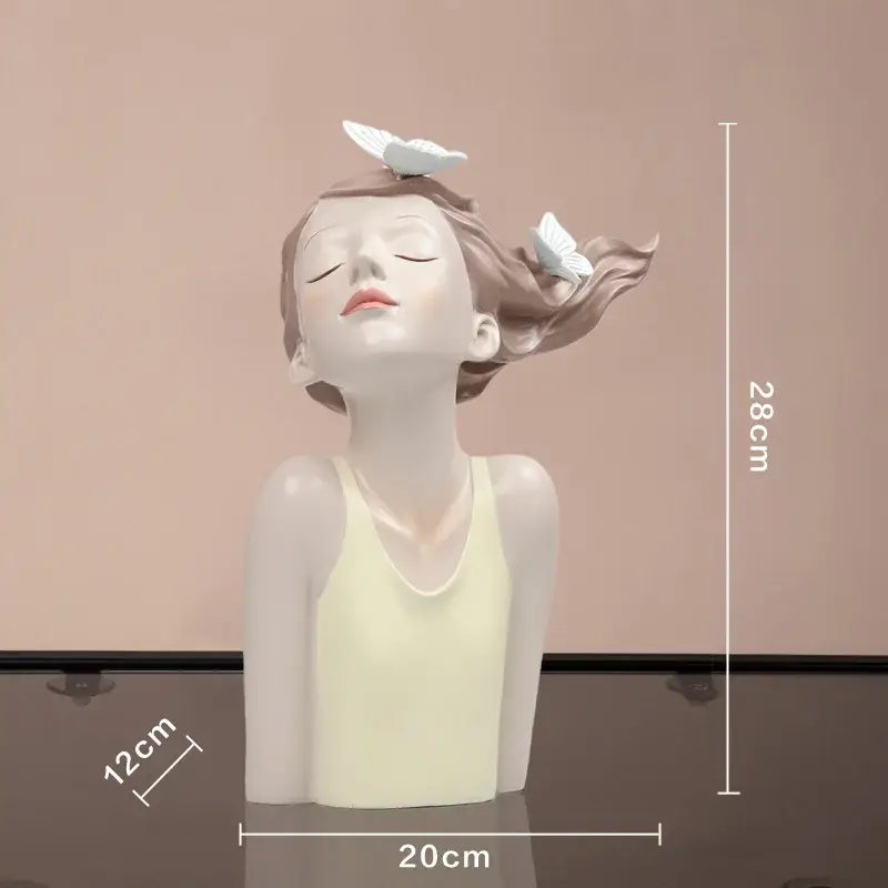 Modern pink butterfly girl sculpture resin decor featuring a matte finish and delicate white butterflies for living room display