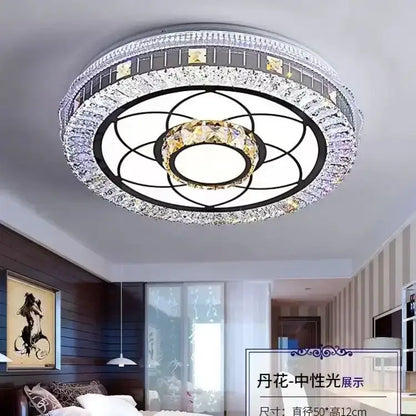 Modern pink and clear crystal led ceiling lamp with black metal frame and concentric rings of clear and yellowish crystals