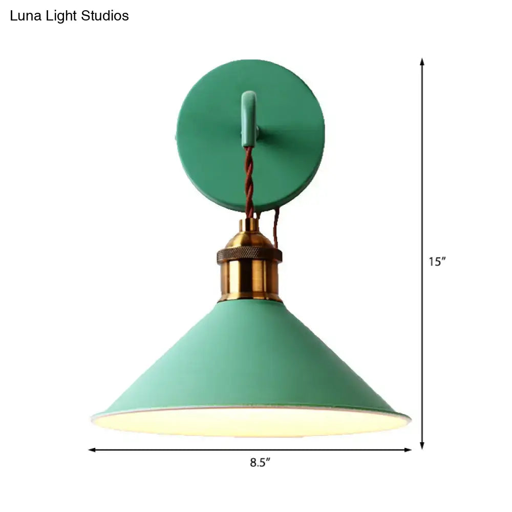Modern pink conical metal wall sconce with teal industrial style brass base and twisted cord for gray pink yellow decor