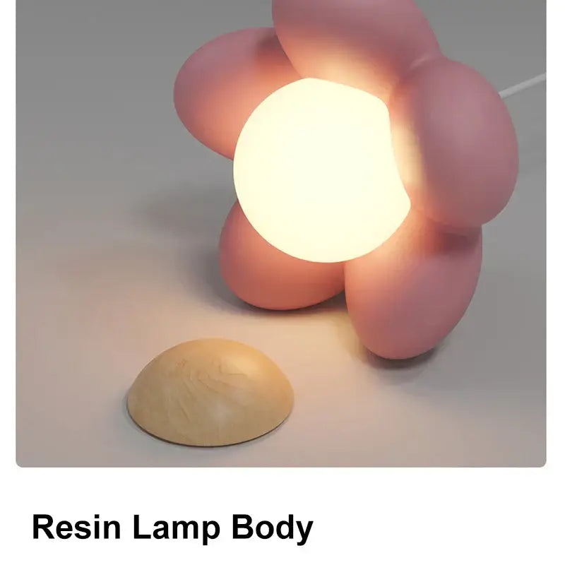 Modern pink flower pendant light with pink resin lamp body and glowing central light for bedroom decorbites cream flower