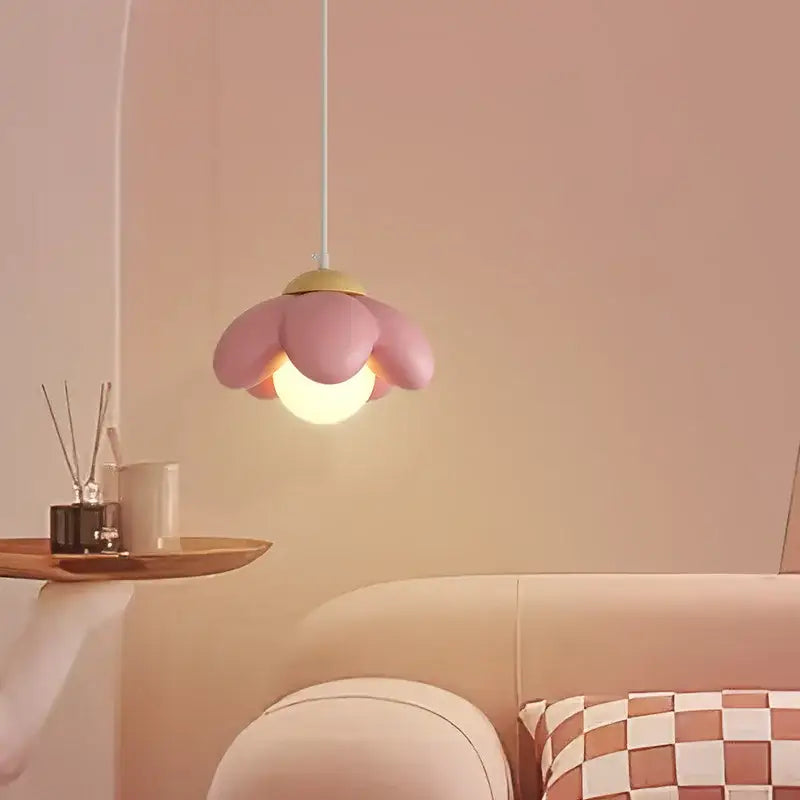 Modern pink flower pendant light with warm glow and gold-toned center for bedroom and living room decorbites cream flower
