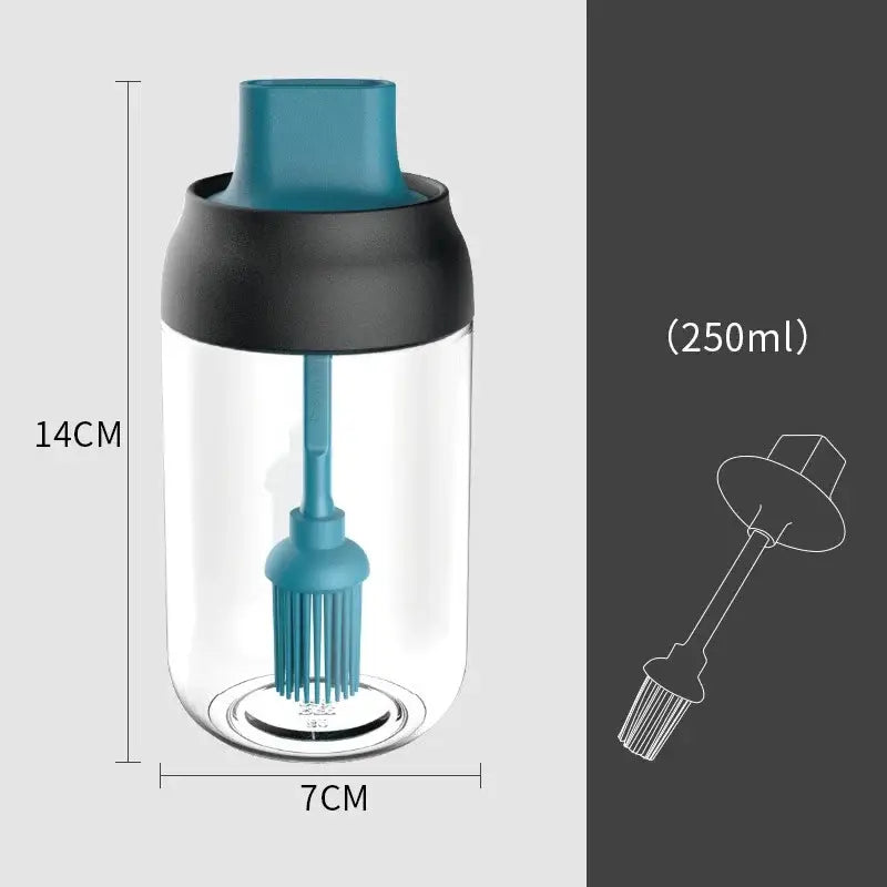 Clear plastic bottle with teal and black lid and integrated brush for oil in modern pink glass seasoning bottle set