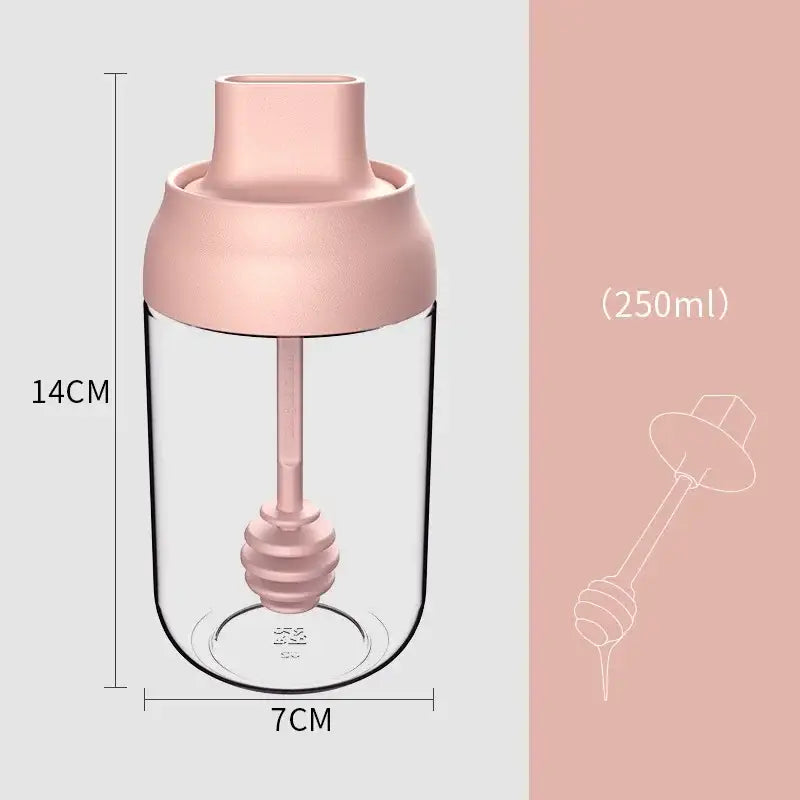 A clear 250ml glass seasoning bottle with pink silicone lid and dipper from modern pink glass seasoning bottle set