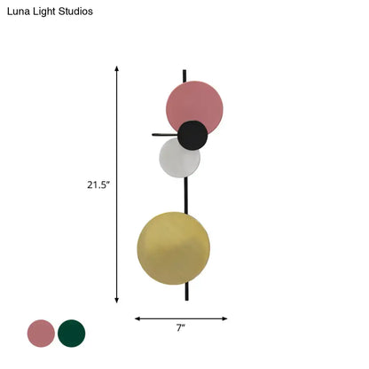 Modern pink and gold circular wall light with stacked matte shades in white yellow led for bedroom lighting