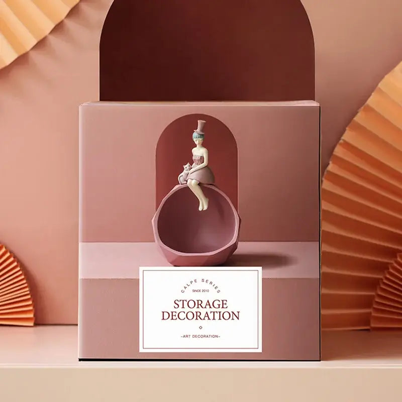 A delicate pink ceramic sculpture tray of an elegant woman with a hat for modern home decor by decorbites
