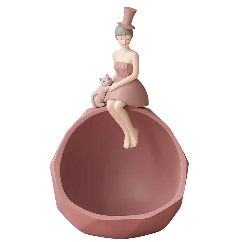 Modern pink resin sculpture tray of an elegant woman with a cat perfect for living room home decor by decorbites