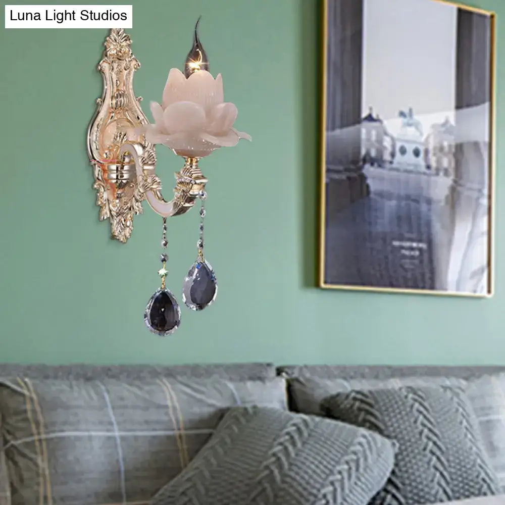 Modern pink lotus wall lamp with milky glass shade and teardrop crystal pendants for bedroom sconce lighting