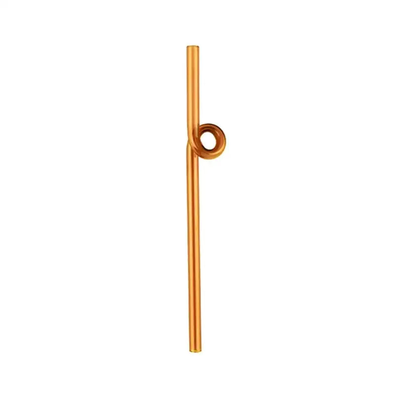 Gold-toned metal bar with loop detail on modern pink and red glass mug set for dining room dessert use