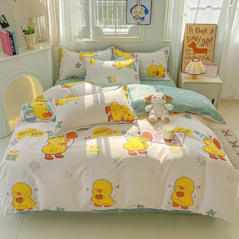 White duvet cover with cheerful yellow duck illustrations and light blue accents in decorbites cartoon printed bedding sets