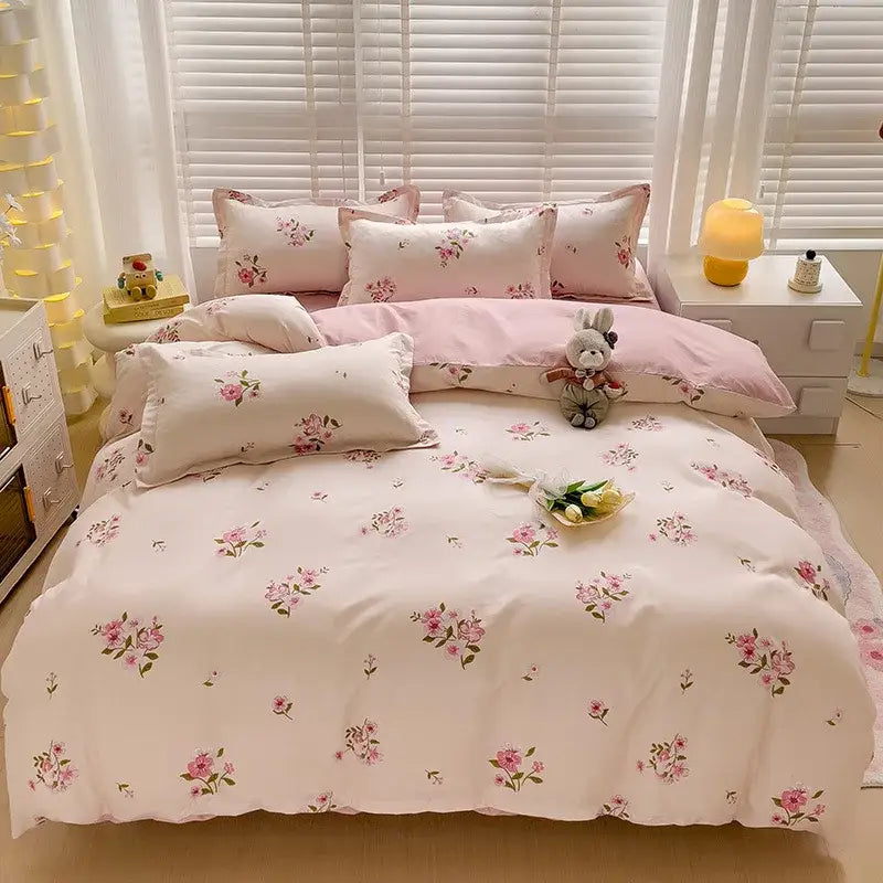 Modern plaid cartoon printed bedding sets featuring pink floral-patterned quilt cover with delicate blossoms on soft fabric