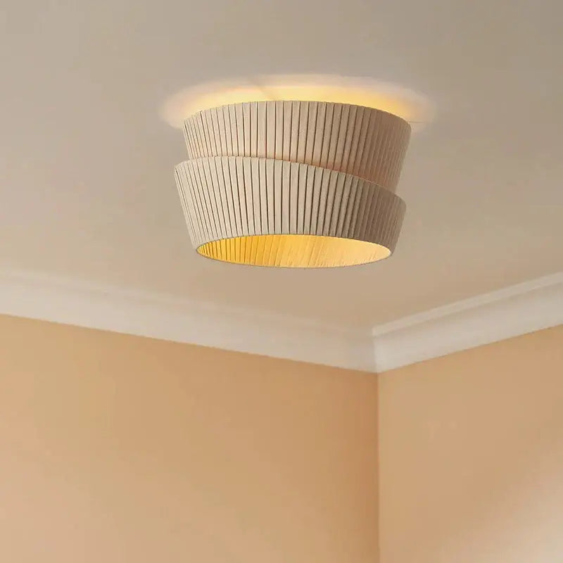 Modern pleated cream led ceiling chandelier with beige paper shade and warm golden glow for living room decorbites cream led