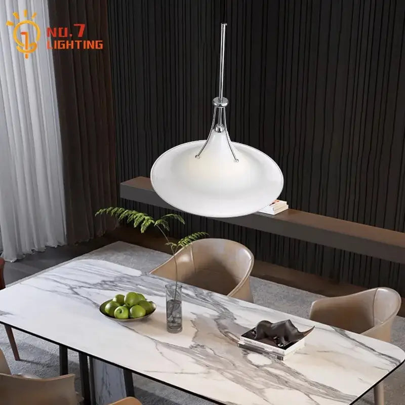 Modern polished chrome french medieval led pendant light in white with chrome suspension above marble dining table