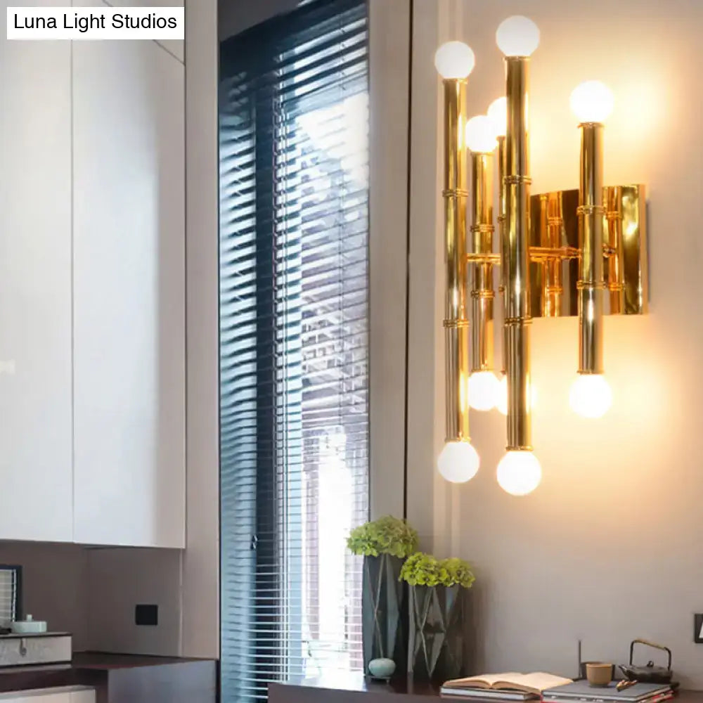Modern polished gold metal tubes bamboo wall sconce with multiple vertical cylindrical tubes and spherical bulbs