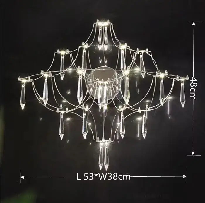 Modern polished steel pendant light with symmetrical multi-tiered crystal prisms and slender steel finish arms for dining room