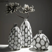 Three modern black and white decorbites bubble glass vases with polka dot textured surfaces for living room decor