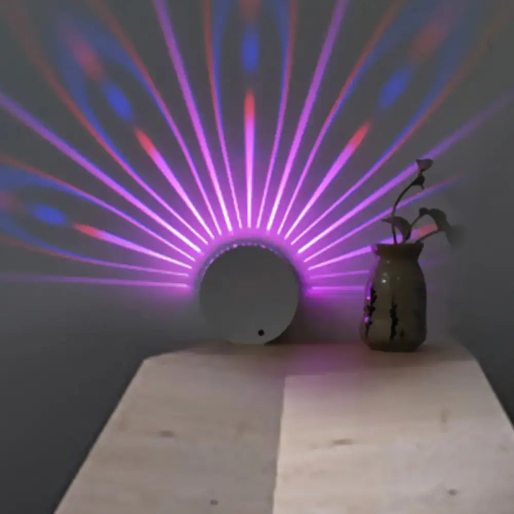 Modern style circular led wall lamp casting vibrant purple and blue radial beams for bedroom decor