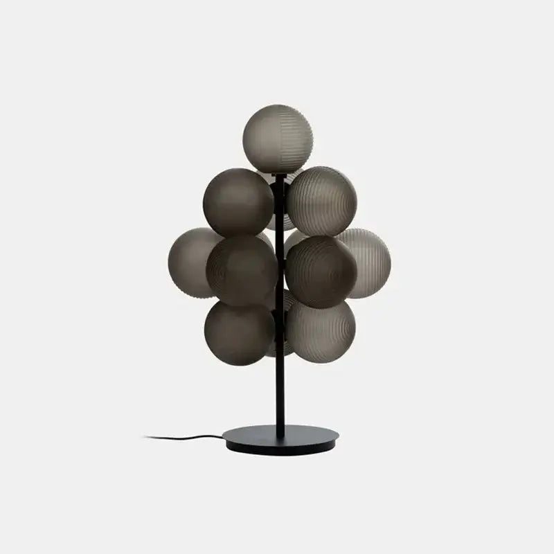 Modern purple decorbites glass bubble floor lamp with black metal stand and smoky gray spherical glass shades for living room
