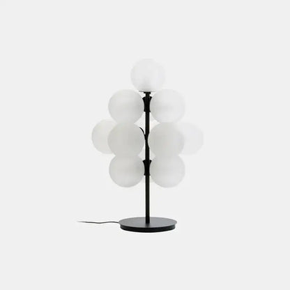 Black metal floor lamp with frosted white glass bubble globes in a tree-like cluster for modern decorbites glass bubble floor use