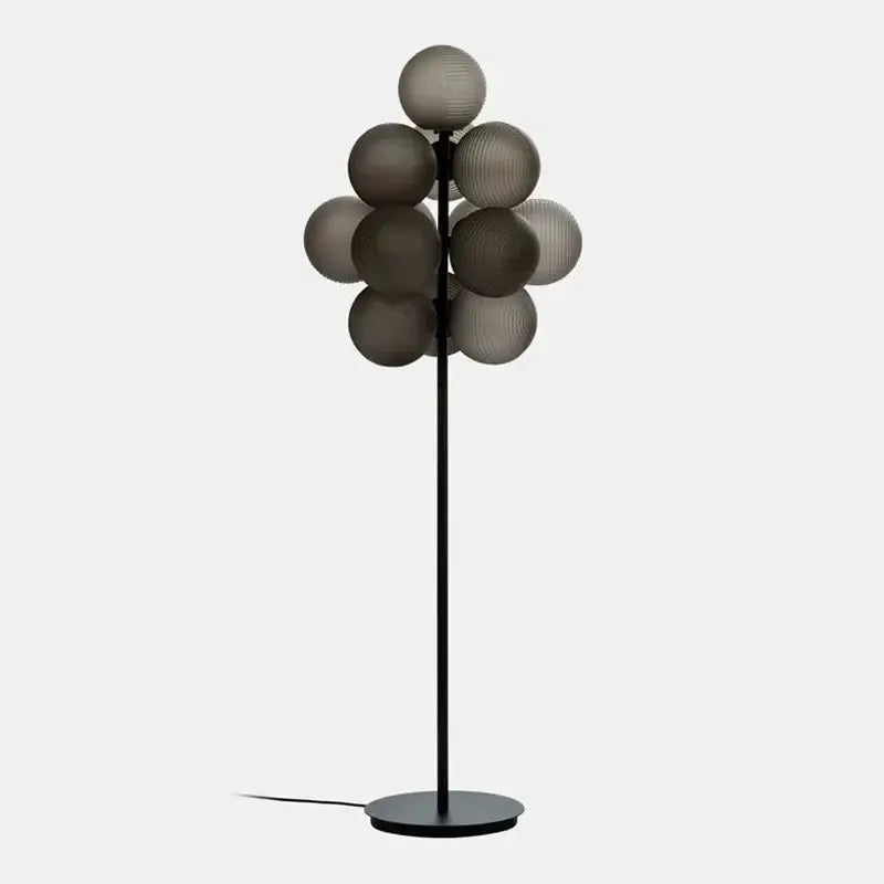 Modern purple decorbites glass bubble floor lamp with slender black metal stand and gray glass bubble shades for living room