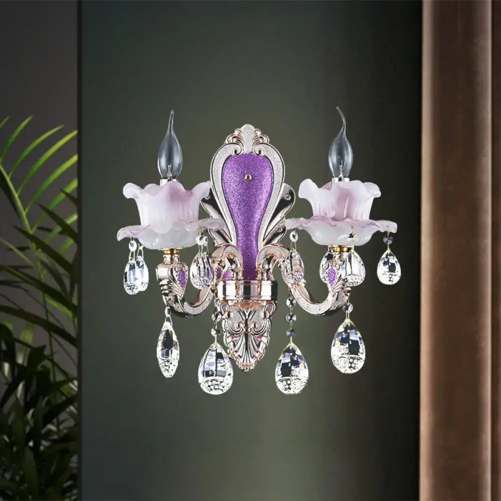 Elegant purple and silver crystal wall sconce with floral glass shades for modern bedroom lighting
