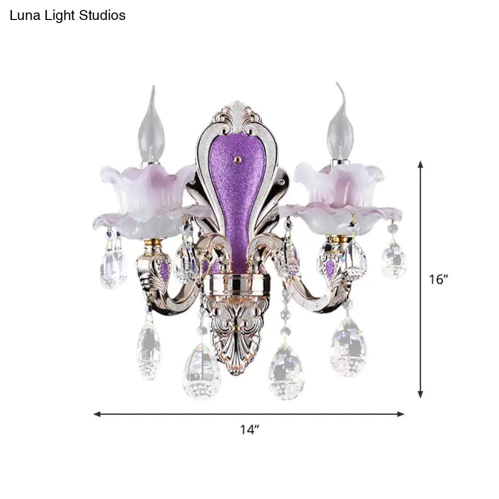 Modern purple and silver crystal wall sconce with ornate design floral lampshades and crystal droplets for bedroom lighting