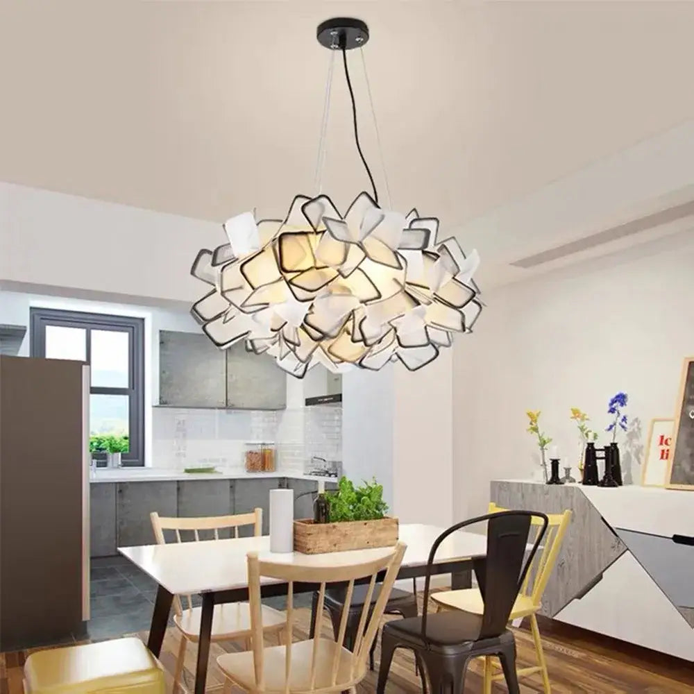 Modern white and black floral pendant light with layered petal design from decorbites clizia led chandelier collection