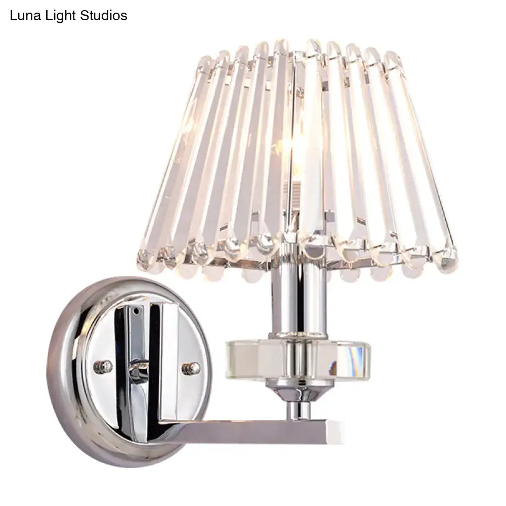 Modern pyramid wall light with chrome finish and cascading crystal shade 12 inch fixture for living room use