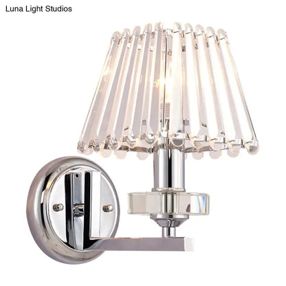 Modern pyramid wall light with chrome finish and cascading crystal shade 12 inch fixture for living room use