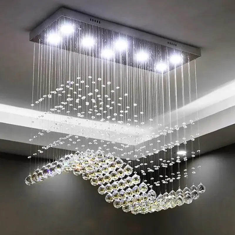 Modern rectangle crystal led chandelier dining room pendant light with sleek metallic frame and cascading clear crystal droplets by decorbites crystal led